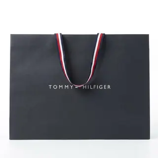 Фірмовий темно-синій паперовий пакет Tommy Hilfiger з білим логотипом та фірмовими смугастими стрічковими ручками 30×42×14.5 см